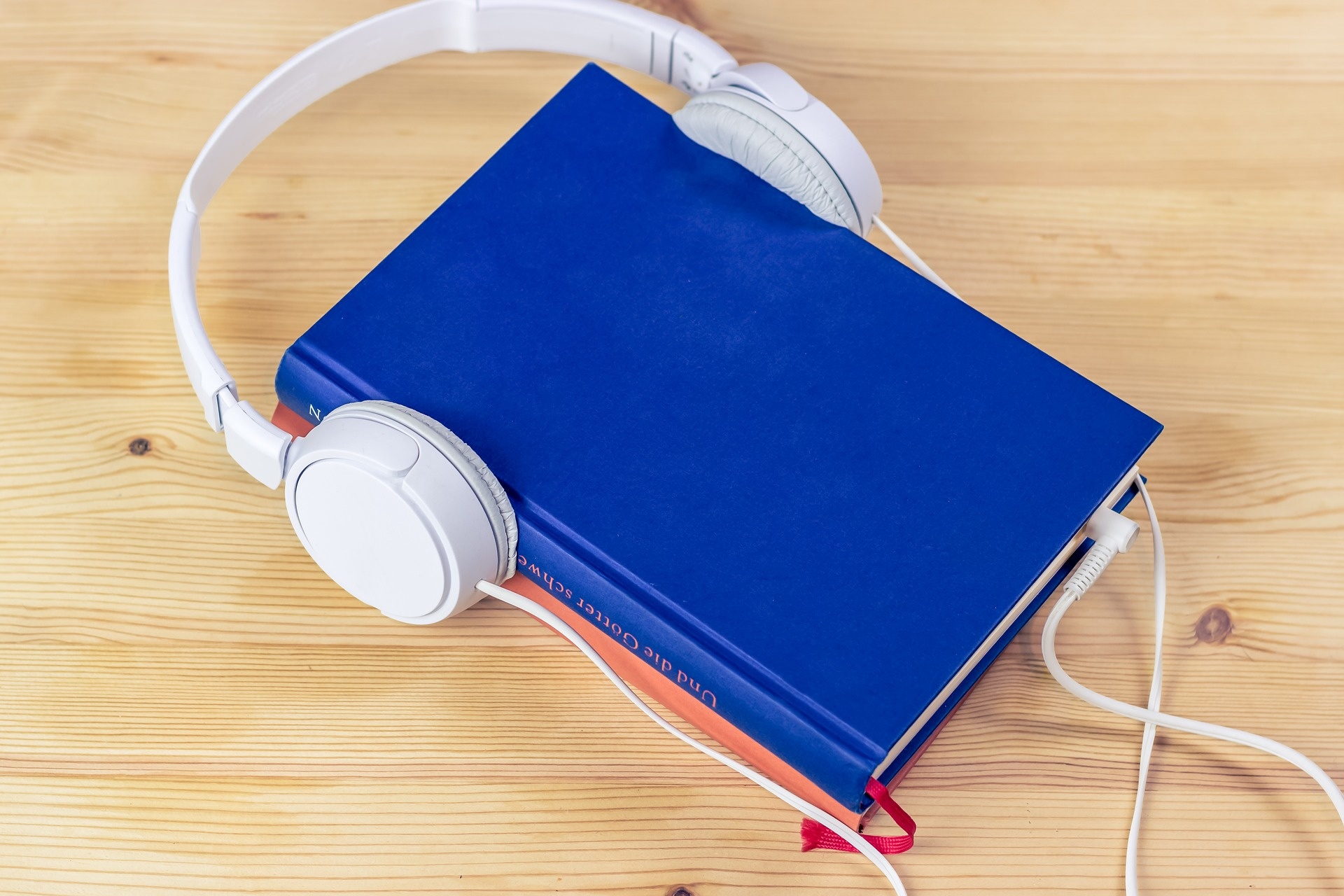 image of book with headphones